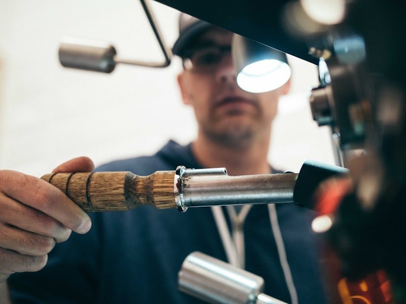 Plumber working on residential pipework in an Ottawa home